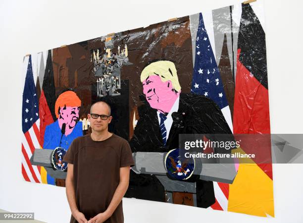 Dutch artist Erik van Lieshout stands in front of his work 'Untitled' in the Art Association in Hanover, Germany, 14 September 2017. The exhibition...