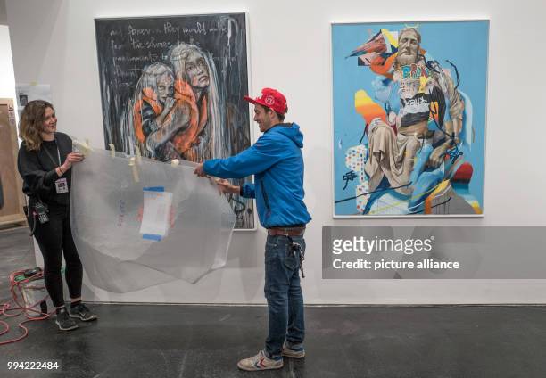 Employees unpack art works in the Urban Nation Museum For Comtemporary Art in Berlin, Germany, 14 September 2017. The museum opens on the 16...