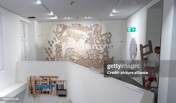 Employees unpack art works in the Urban Nation Museum For Comtemporary Art in Berlin, Germany, 14 September 2017. The museum opens on the 16...