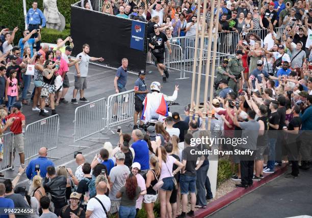 Travis Pastrana rides through the crowd during HISTORY's Live Event 'Evel Live' at Omnia Nightclub at Caesars Palace on July 8, 2018 in Las Vegas,...