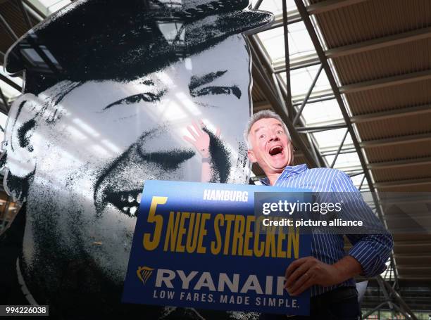 Michael O'Leary, the CEO of Ryanair, gives a presentation at a press conference in a conference room in the terminal of the airport in Hamburg,...