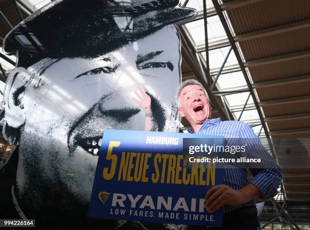 Michael O'Leary, the CEO of Ryanair, gives a presentation at a press conference in a conference room in the terminal of the airport in Hamburg,...