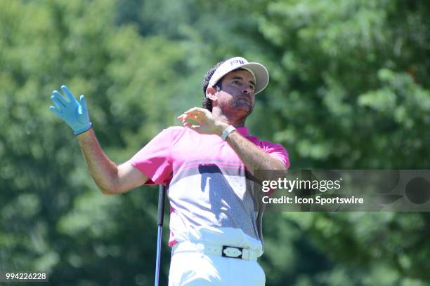 Bubba Watson lets go of his club on his tee shot on the third hole during the final round of the Military Tribute at the Greenbrier in White Sulphur...