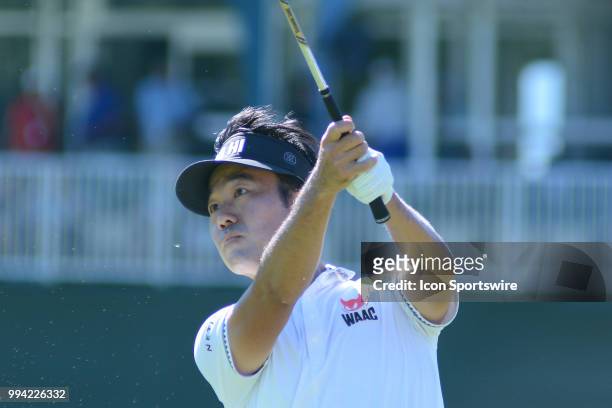 Kevin Na stairs down his tee shot on the par 3 18th hole during the final round of the Military Tribute at the Greenbrier in White Sulphur Springs,...