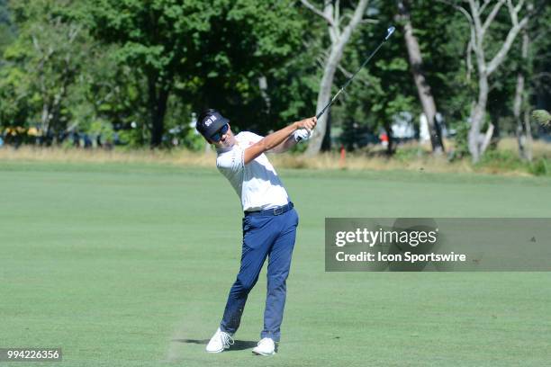 Kevin Na hits his approach shot on the 13th hole during the final round of the Military Tribute at the Greenbrier in White Sulphur Springs, WV, on...