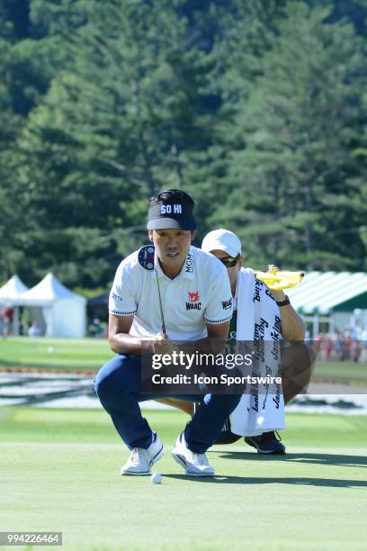 Kevin Na reads his put on the 18th hole during the final round of the Military Tribute at the Greenbrier in White Sulphur Springs, WV, on July 8,...