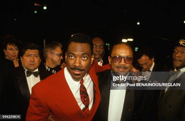 Le comedien Eddie Murphy et le musicien Quincy Jones a la soiree 'ln bed with Madonna' au Festival de Cannes le 13 mai 1991 a Cannes, France.