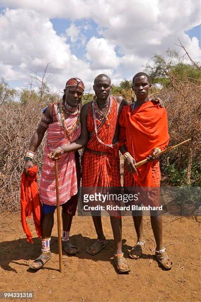 Three Maasai men wearing the distinctive shuka cloth in Kenya, 2016.
