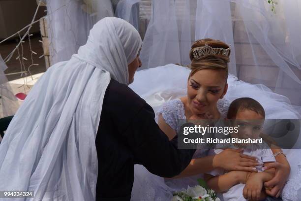 Druze bride at her wedding in Daliyat al-Karmel, a Druze town in the Haifa District of Israel, 2015.