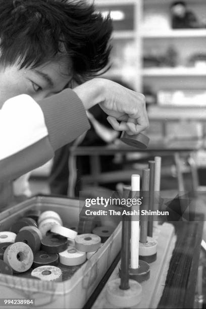 Minamata disease patient at an rehabilitation center 30 years after mercury poisoning recognised on April 13, 1986 in Minamata, Kumamoto, Japan.