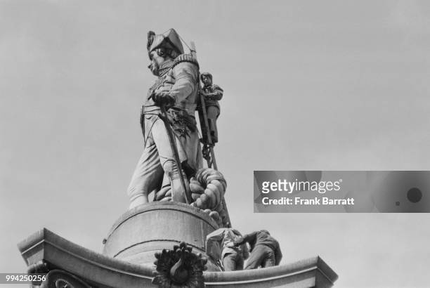 'Blue Peter' presenter John Noakes climbs Nelson's Column in Trafalgar Square, London, 29th April 1977.