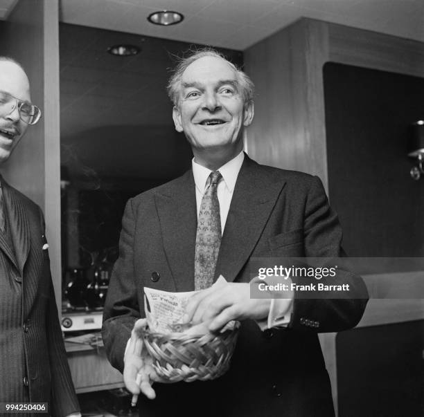 Scottish Conservative politician Michael Noble , the Minister for Trade, tries some fish and chips from the restaurant of the Portland Hotel at 22...