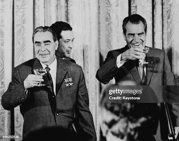 President Richard Nixon and Russian leader Leonid Brezhnev share a champagne toast after signing two Treaty Declarations at the White House in...
