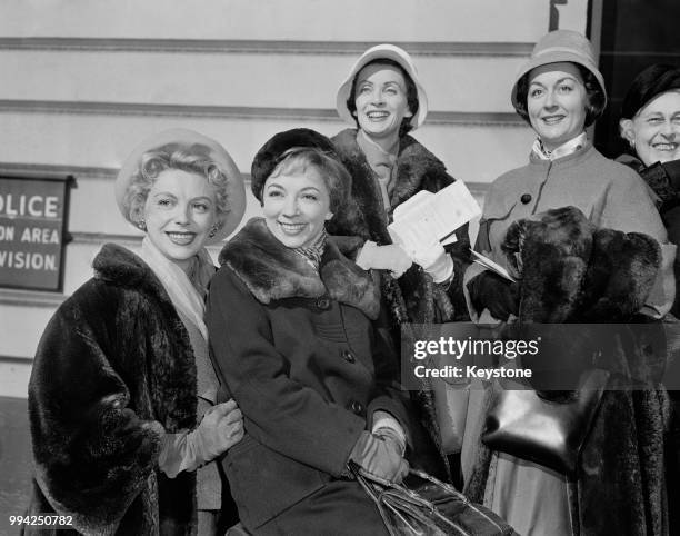 Four members of the Comédie-Française arrive at Victoria Station in London for the opening performance of their three-week season at the Princes'...