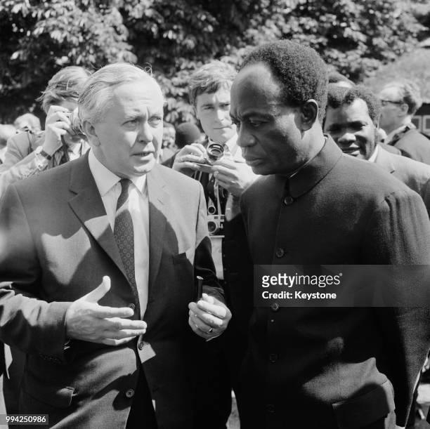 Kwame Nkrumah , Prime Minister of Ghana, chats to British Prime Minister Harold Wilson in the garden of Marlborough House, London, at the opening of...