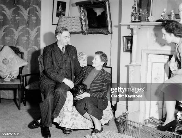 Irish politician John A. Costello , the new Taoiseach, at home in Dublin Park with his wife Ida Mary Costello , 21st February 1948.