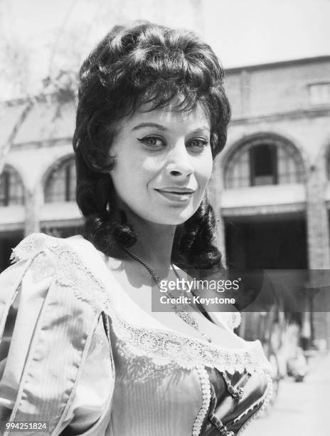French actress Magali Noël on the set of the film 'Il colpo segreto di D'Artagnan' in Rome, Italy, 26th April 1962. She plays Carlotta in the film.