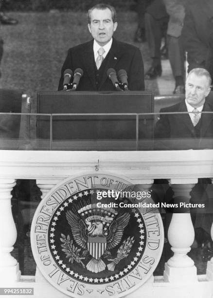 President Richard Nixon delivers his inaugural address after taking the Oath of Office for his second term, Washington, DC, 20th January 1973. Vice...