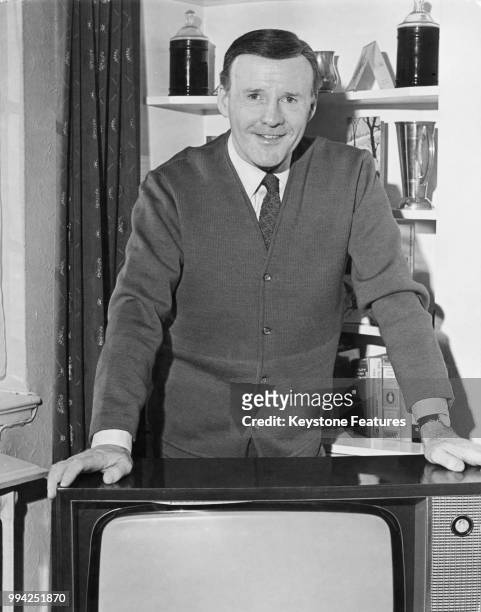 English disc jockey Jimmy Young , a former singer, at his home in Chiswick, London, 1971.