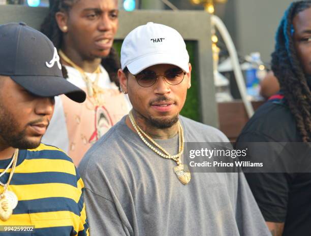 Singer Chris Brown attends The 4th of July Day Party at Compound on July 4, 2018 in Atlanta, Georgia.