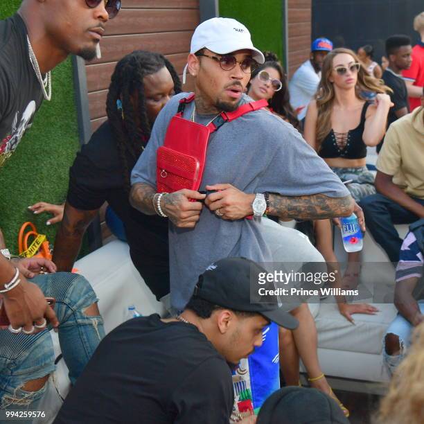 Singer Chris Brown attends The 4th of July Day Party at Compound on July 4, 2018 in Atlanta, Georgia.