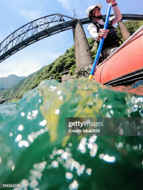 low angle view of a white water river rafting excursion - perspetiva do passageiro imagens e fotografias de stock