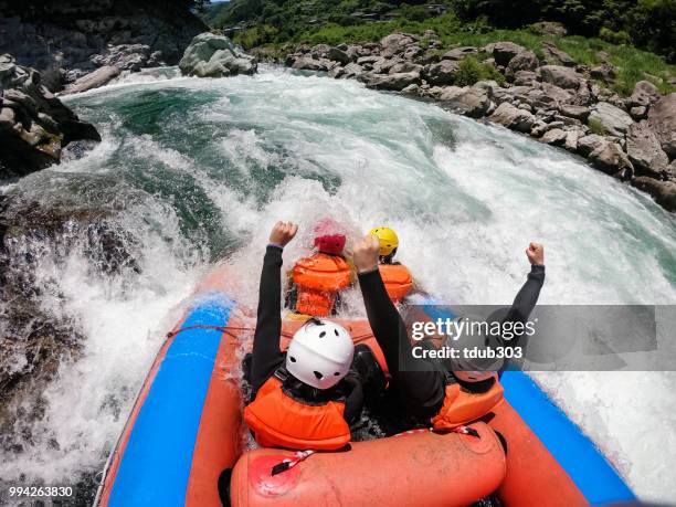 personal point of view of a white water river rafting excursion - perspetiva do passageiro imagens e fotografias de stock