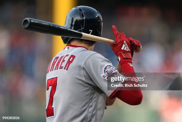 Trea Turner of the Washington Nationals wears Adidas batting gloves as he bats during a game against the Philadelphia Phillies at Citizens Bank Park...