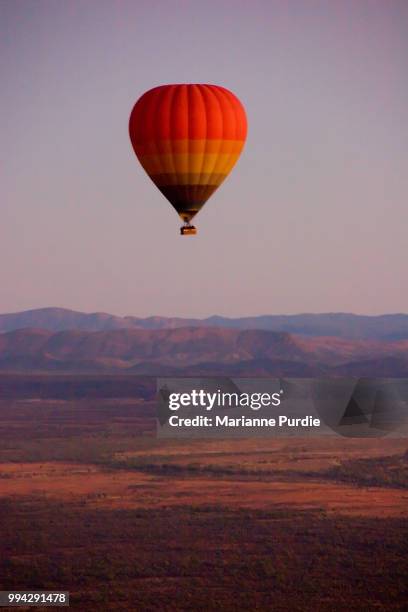 hot air ballooning over the desert - fun northern territory stock pictures, royalty-free photos & images