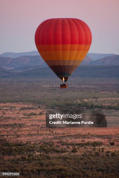 hot air ballooning over the desert - fun northern territory stock pictures, royalty-free photos & images