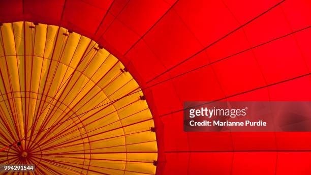 hot air balloon deflating after a flight - fun northern territory stock pictures, royalty-free photos & images