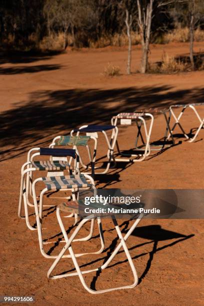 stools around a campsite in the desert - fun northern territory stock pictures, royalty-free photos & images