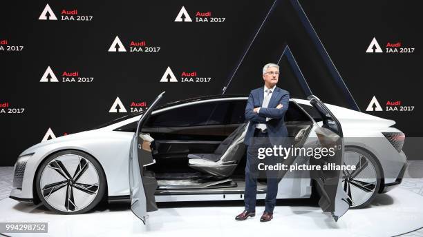 Audi Chairman, Rupert Stadler, standing beside the concept study Audi Aicon at the International Motor Show in Frankfurt am Main, Germany, 14...