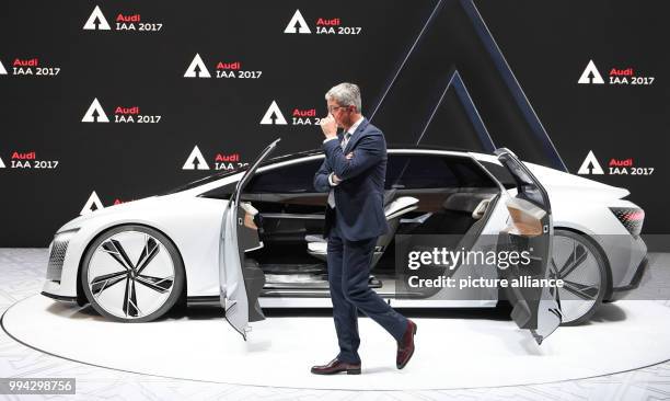 Audi Chairman, Rupert Stadler, standing beside the concept study Audi Aicon at the International Motor Show in Frankfurt am Main, Germany, 14...