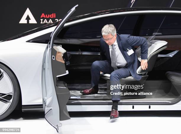 Audi Chairman, Rupert Stadler, exiting the concept study Audi Aicon at the International Motor Show in Frankfurt am Main, Germany, 14 September 2017....