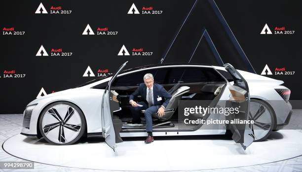 Audi Chairman, Rupert Stadler, exiting the concept study Audi Aicon at the International Motor Show in Frankfurt am Main, Germany, 14 September 2017....