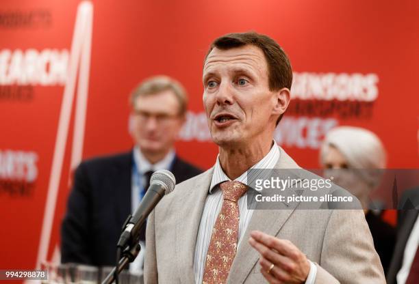 Prince Joachim of Denmark delivers remarks at the joint booth of the Danish exhibitors at the 'HUSUM Wind' wind energy trade fair in Husum, Germany,...