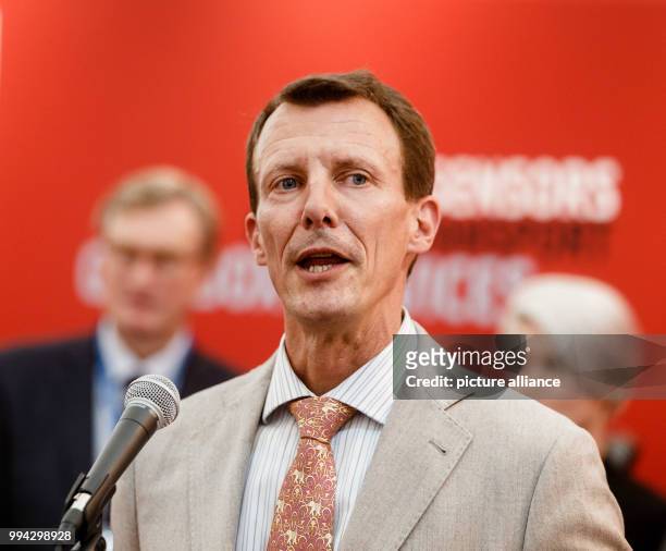 Prince Joachim of Denmark delivers remarks at the joint booth of the Danish exhibitors at the 'HUSUM Wind' wind energy trade fair in Husum, Germany,...