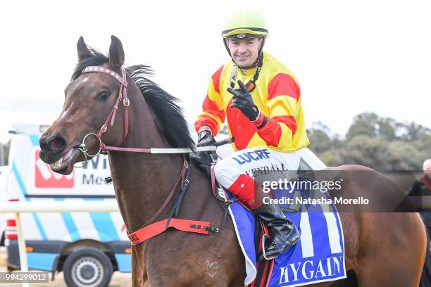 Dean Yendall returns to the mounting yard aboard Invincible Fille after winning the Mildura Cup Packages Available Now Maiden Plate at Mildura...