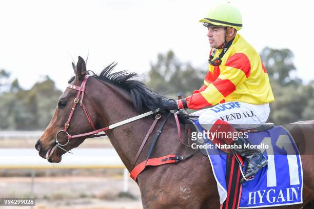 Dean Yendall returns to the mounting yard aboard Invincible Fille after winning the Mildura Cup Packages Available Now Maiden Plate at Mildura...