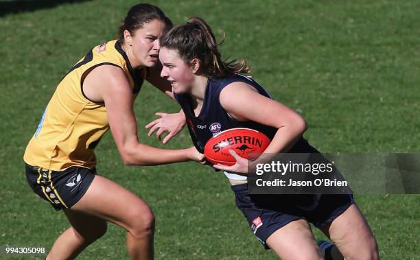 Vic Metro's Katie Lynch in action during the AFLW U18 Championships match between Vic Metro and Western Australia at Metricon Stadium on July 9, 2018...