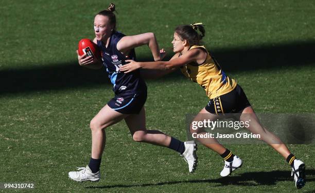 Vic Metro's Hannah Mclaren in action during the AFLW U18 Championships match between Vic Metro and Western Australia at Metricon Stadium on July 9,...