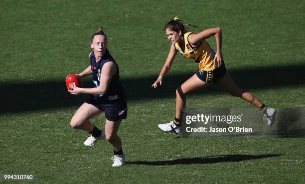 Vic Metro's Hannah Mclaren in action during the AFLW U18 Championships match between Vic Metro and Western Australia at Metricon Stadium on July 9,...