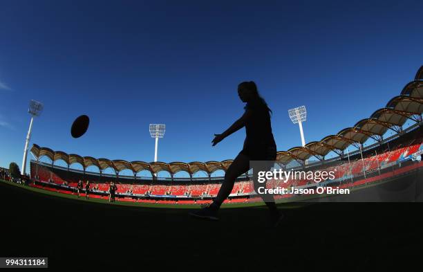 Eastern Allies players warm up during the AFLW U18 Championships match between Eastern Allies and Central Allies at Metricon Stadium on July 9, 2018...