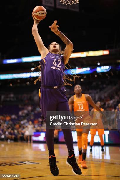 Brittney Griner of the Phoenix Mercury attempts a shot against the Connecticut Sun during the first half of WNBA game at Talking Stick Resort Arena...