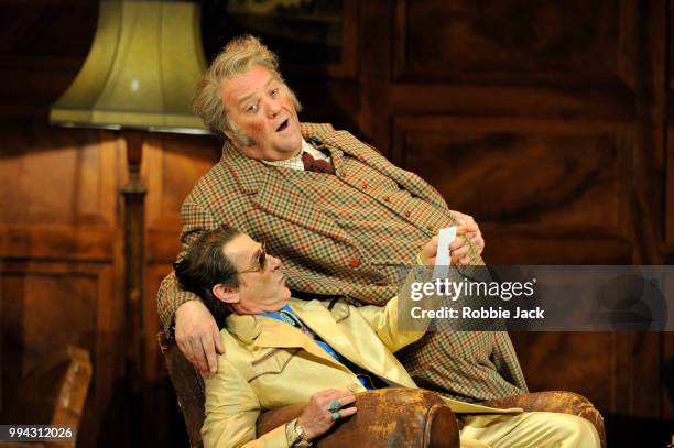 Simon Keenlyside as Ford and Bryn Terfel as Sir John Falstaff in the Royal Opera's production of Giuseppe Verdi's Falstaff directed by Robert Carsen...