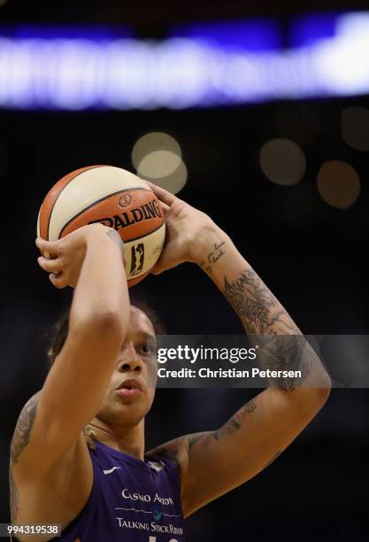 Brittney Griner of the Phoenix Mercury shoots a free-throw shot against the Connecticut Sun during the first half of WNBA game at Talking Stick...