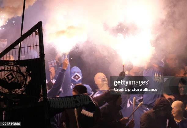 Hamburg fans getting fired up at the German Bundesliga soccer match between Hannover 96 and Hamburger SV in the HDI Arena in Hanover, Germany, 15...