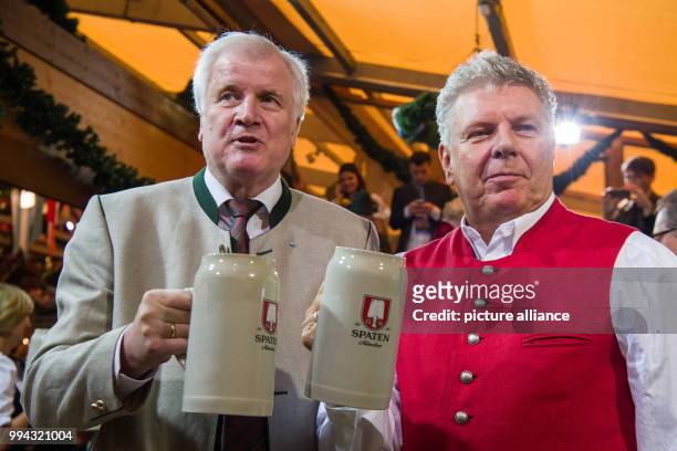 Kick-off of the Oktoberfest in Munich, Germany, 16 September 2017. Bavaria's Premier Horst Seehofer and Munich's mayor Dieter Reiter toast with the...