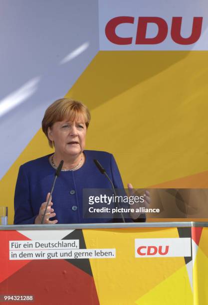 German chancellor Angela Merkel speaks during a campaign event of the Christian Democratic Union of Germany at the Kurplatz in Binz, Germany, 16...